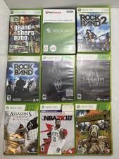 Lot of 9 Xbox 360 Games w/ Cases, Manuals, and Maps. GTA, Skyrim, Rock Band, etc