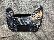This is a SCUF Impact "Eliteshot Empire" edition PlayStation 4 controller.