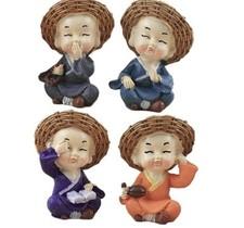 Set Of 4 Resin Monk Figurines