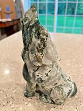 Moss agate wolf carving