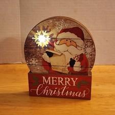 Merry Christmas! SANTA CLAUS Wooden Snowglobe Shape Decor SNOWFLAKE Lights Up!!