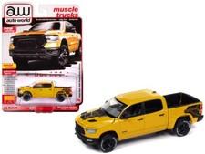 2023 RAM 1500 REBEL HAVOC ED. PICKUP BAJA YELLOW 1/64 AUTO WORLD 64462-AWSP164 A