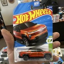 Hot Wheels Chevrolet Silverado EV RST HW EV 1:64 Orange Diecast Pickup Truck