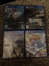 PS 4 Bundle Of 4 Games (God Of War, Tony Hawk, Assassin’s Creed, Sonic Racing)