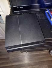 Sony PlayStation 4 Console, 3 Wireless Controllers, Charging Dock, 4 PS4 Games