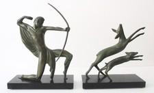 Michel Decoux: 2-Piece Bronze Sculpture "A Hunter With Bow Chasing Two Deer"