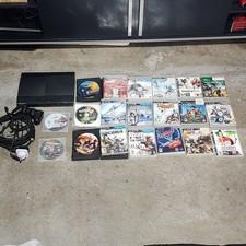 PlayStation 3 Super Slim 500GB Black Console Bundle with Games.