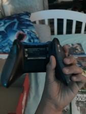 bunch of games xbox and ps4 games combined with a controller