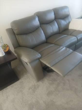 GRAY LEATHER SOFA W/RECLINER
