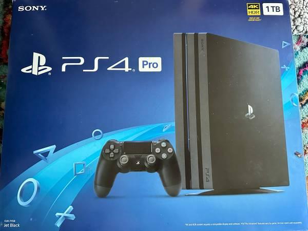 PS4 Pro 1TB (excellent condition, includes all cables and controller, in origina 3