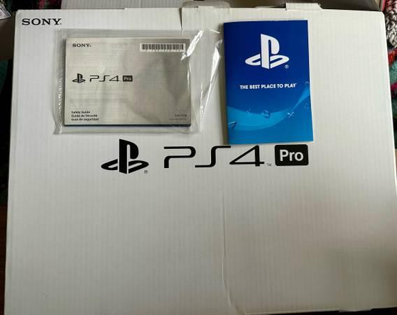 PS4 Pro 1TB (excellent condition, includes all cables and controller, in origina 7