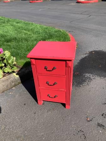 Red bedside side table, 3 drawers.