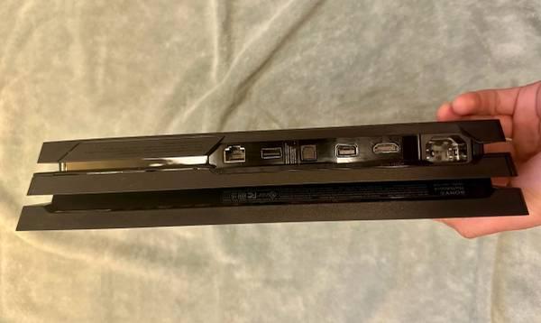 PS4 Pro 1TB (excellent condition, includes all cables and controller, in origina 13