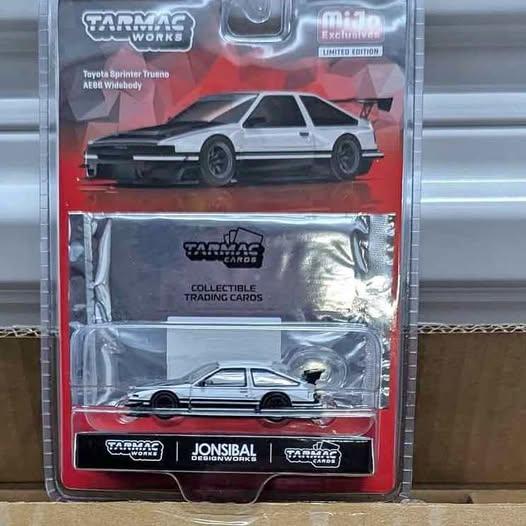Tarmac Works 1:64 Toyota Sprinter Trueno AE86 Widebody by Jon Sibal with Trading Card – White
