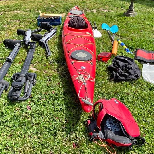 Thule Hullavator, and Wilderness System Tsunami 13.5 kayak, and gear