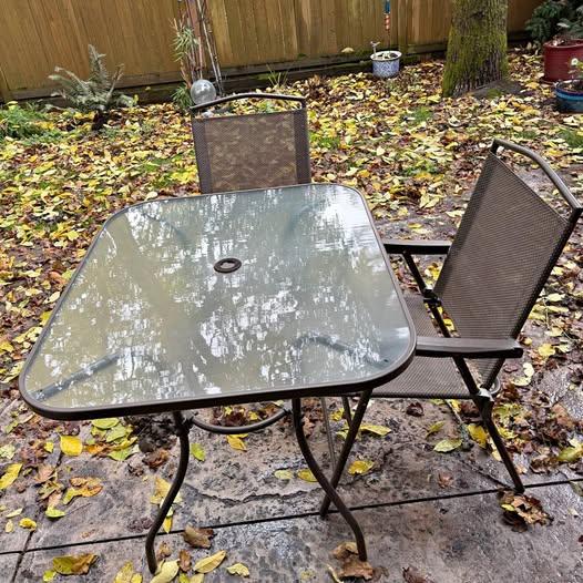 Outside table and chairs with umbrella