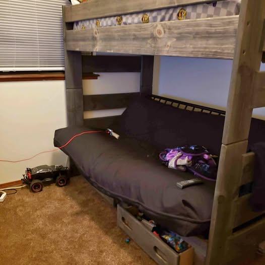 Wood bunk bed with futon frame and drawers underneath