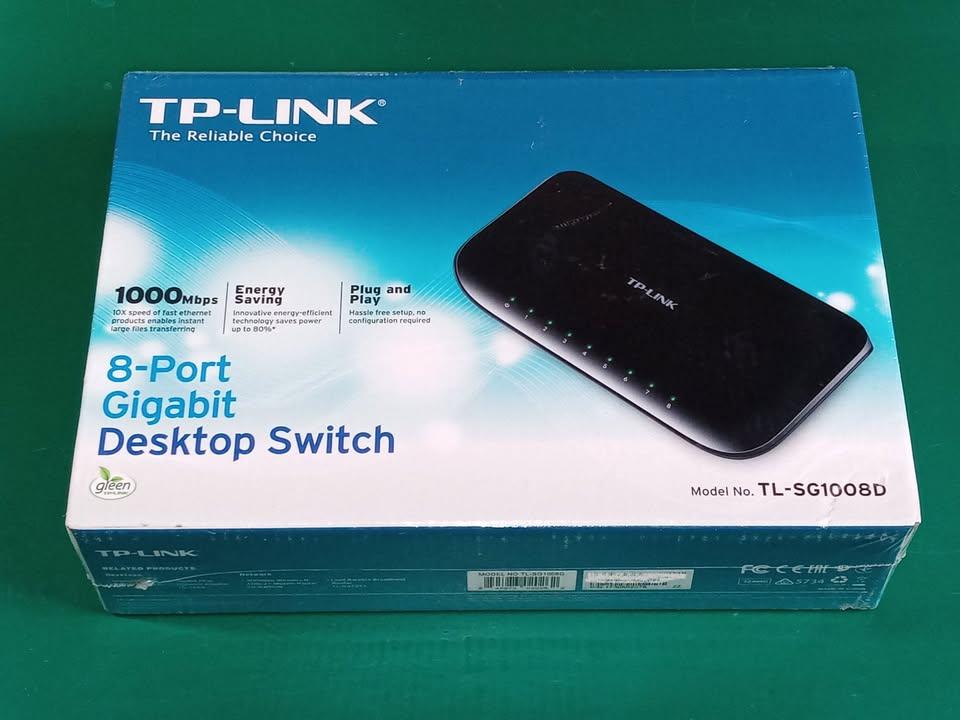 Network equipment, seven items total - two wifi routers, five switches 2