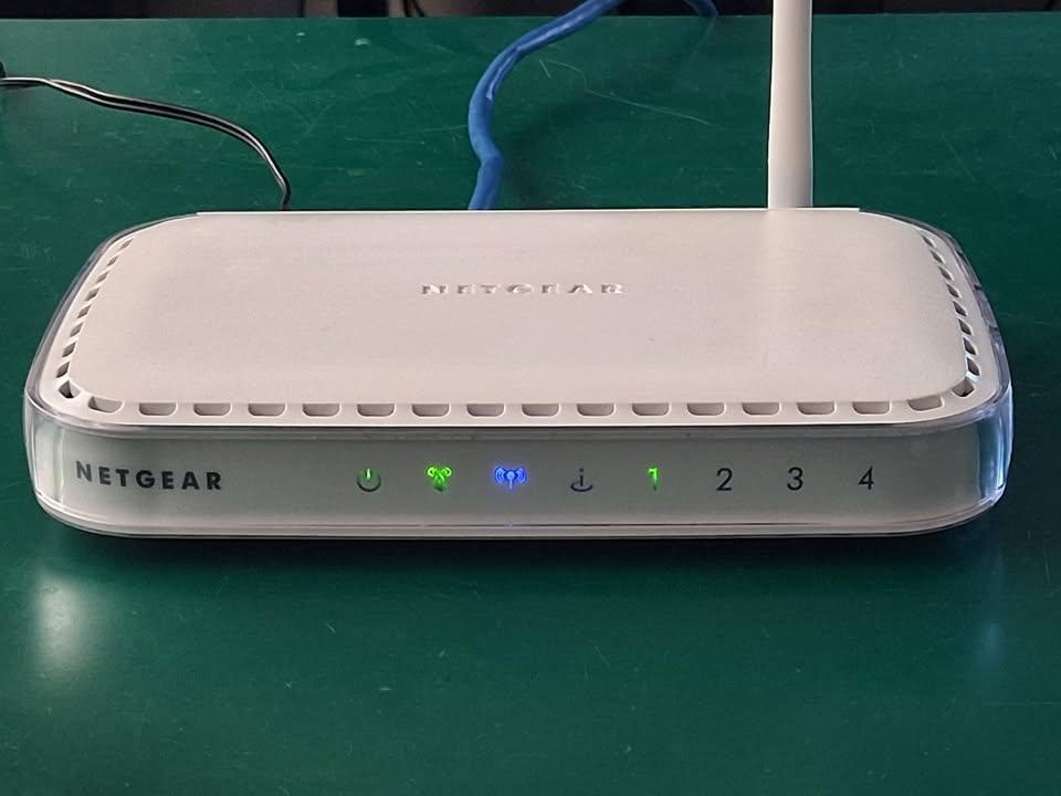 Network equipment, seven items total - two wifi routers, five switches 6