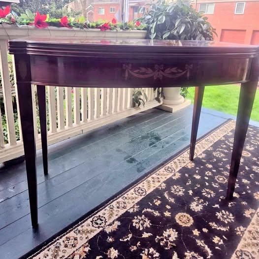 Antique mahogany and satinwood inlaid demi-lune console table.