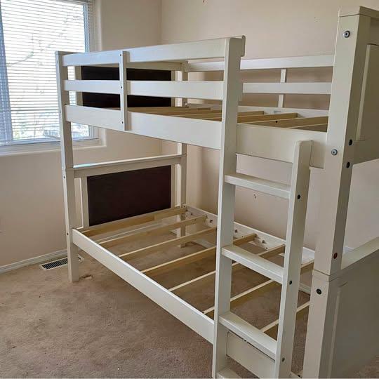 Sturdy white twin-over-twin bunk bed