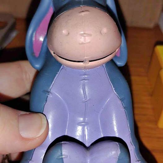 Old Eeyore kids squeeze toy .. 80's ? 90's ? Been in storage for a very long time .