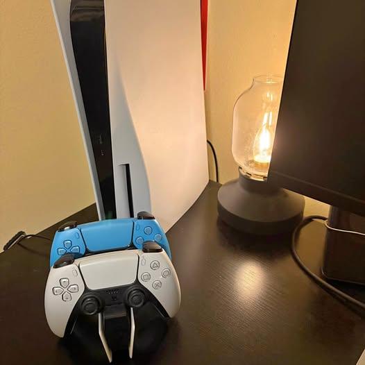 Playstation 5 with 2 controllers and charging station