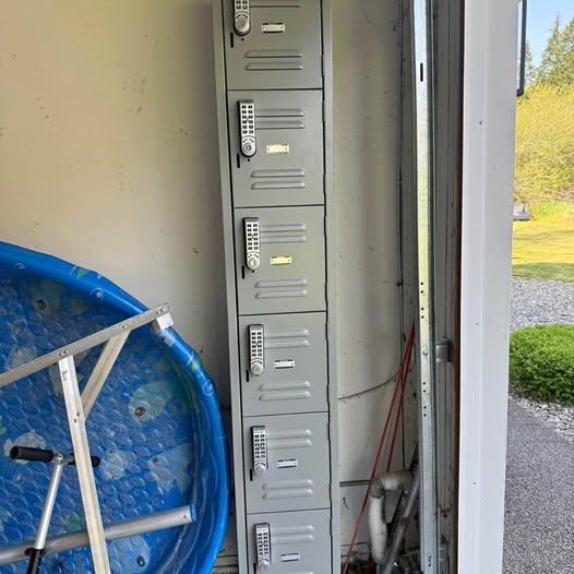 Tall industrial locking metal cabinet