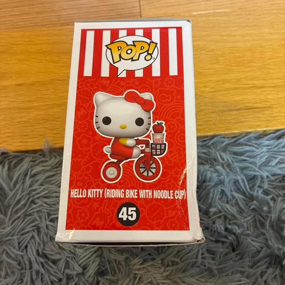 Hello Kitty Riding Bike With A571 5