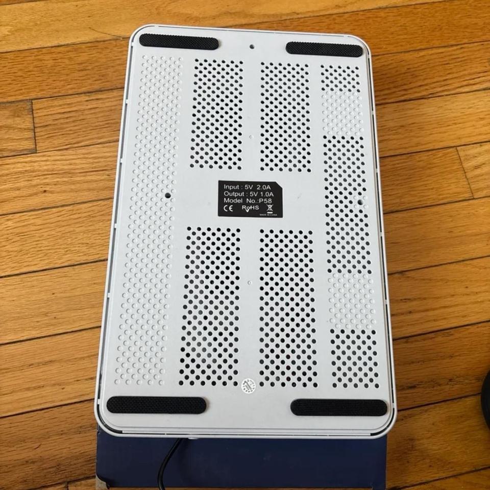 White Playstation 5 Controller Charging 4