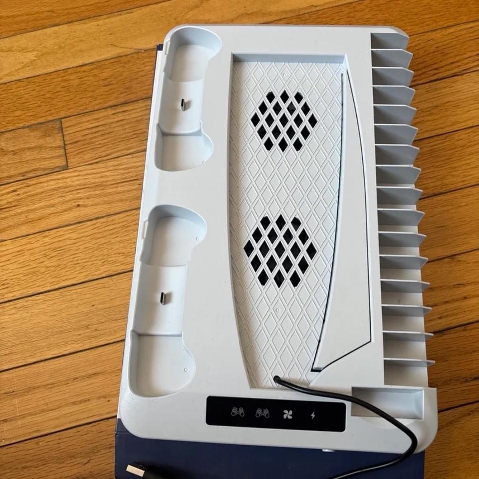 White Playstation 5 Controller Charging 2