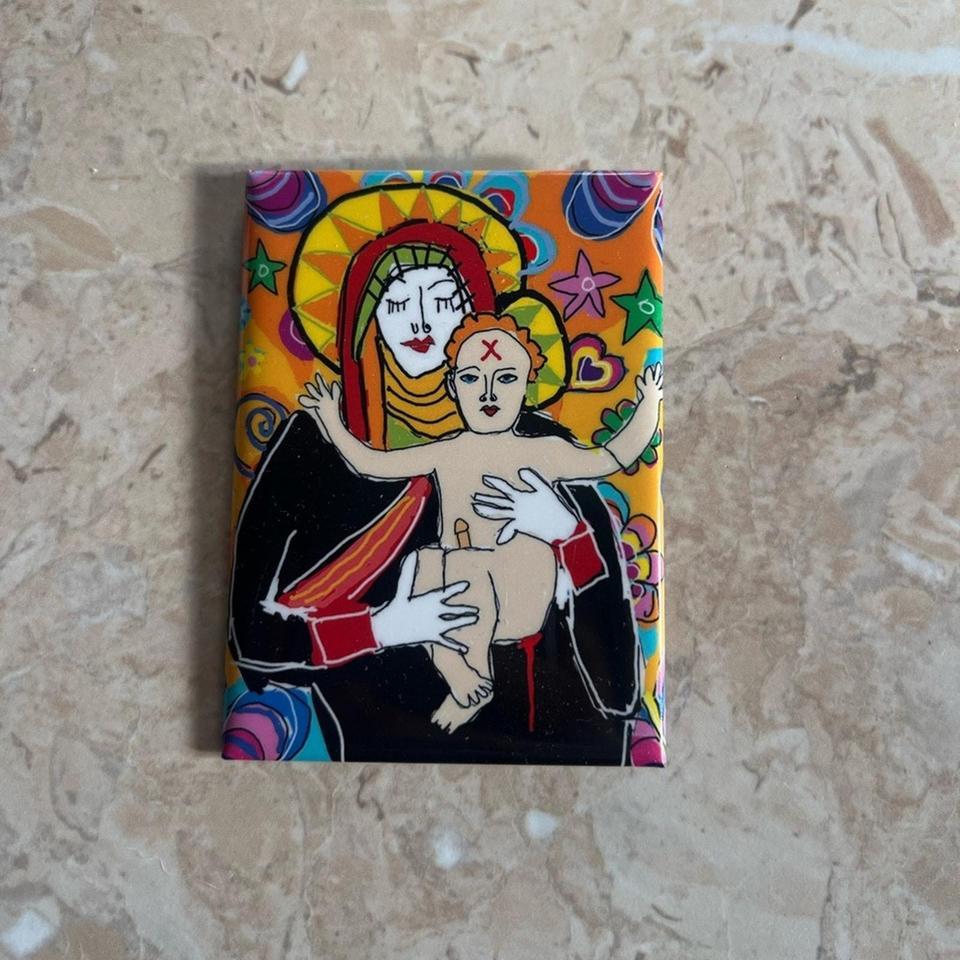 Metal Pin Featuring Mary And