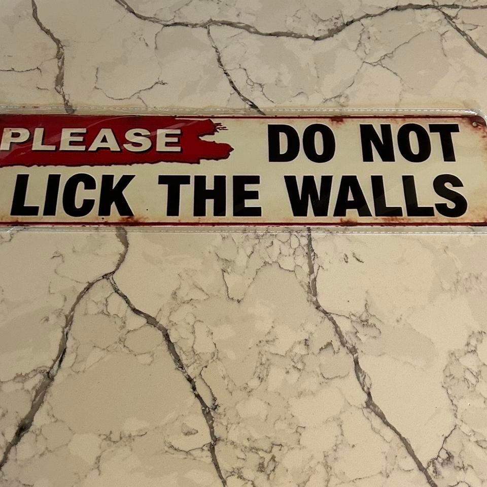 Aluminum Wall Sign That Reads 55f9