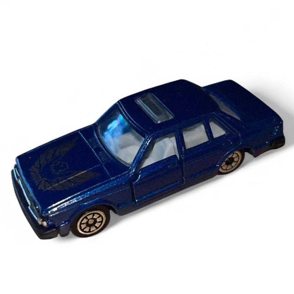 Blue Datsun Bluebird 910 Nissan