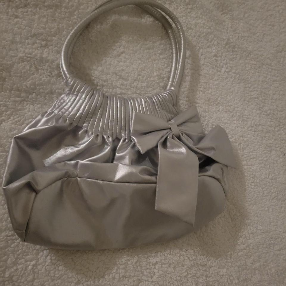 Silver Bow Purse With A