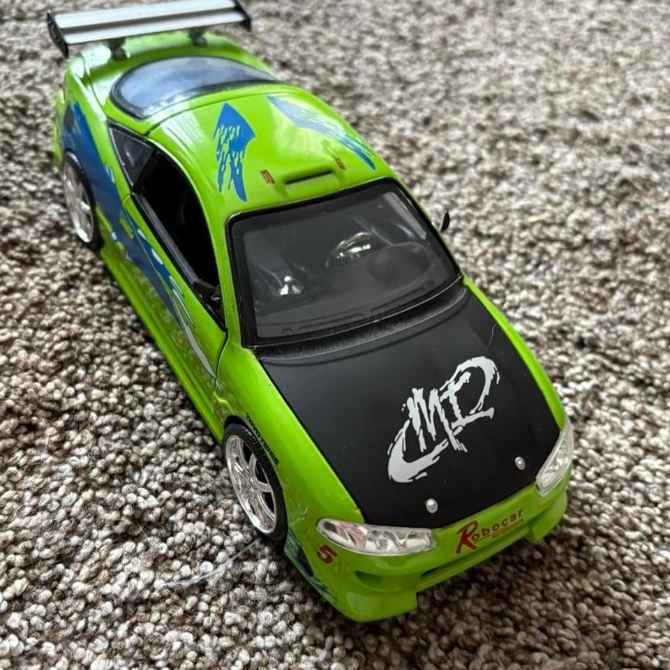 Green And Black Mitsubishi Eclipse D7b9