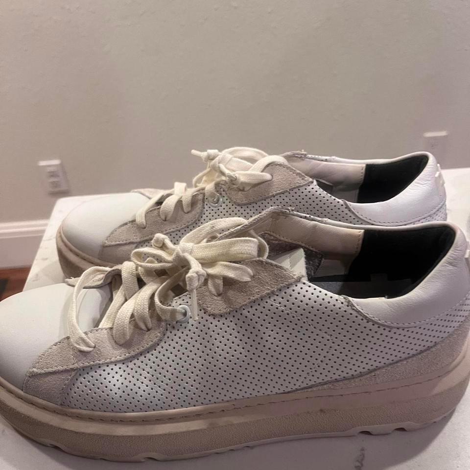 A Clean White Low Top Sneaker 2