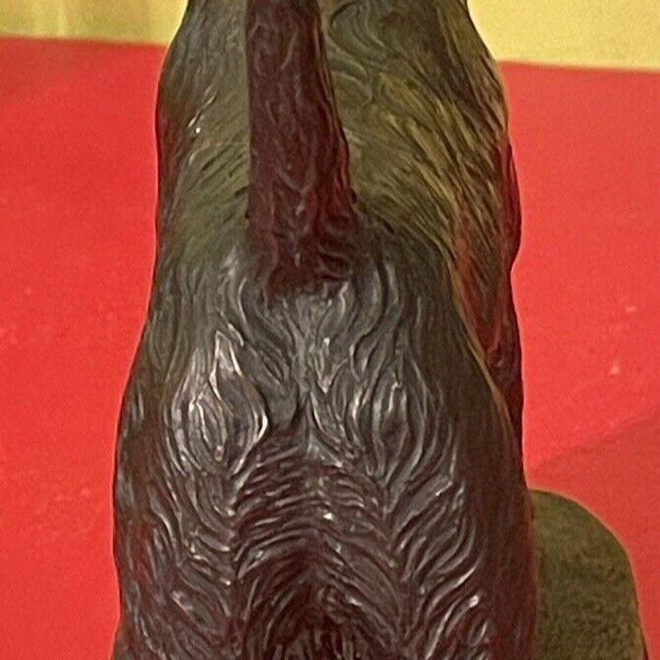 This Antique Sculpture Features A 4