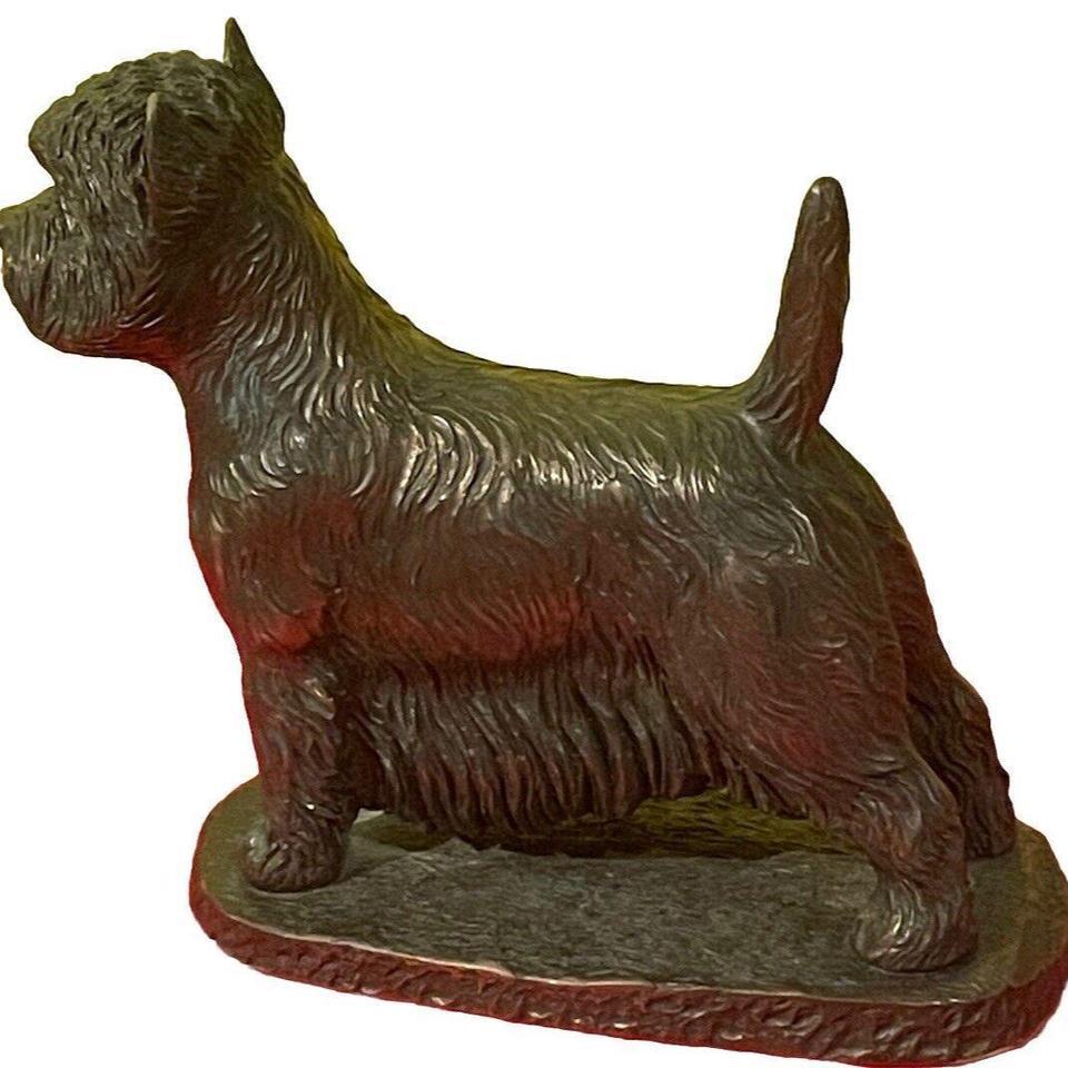 This Antique Sculpture Features A 3