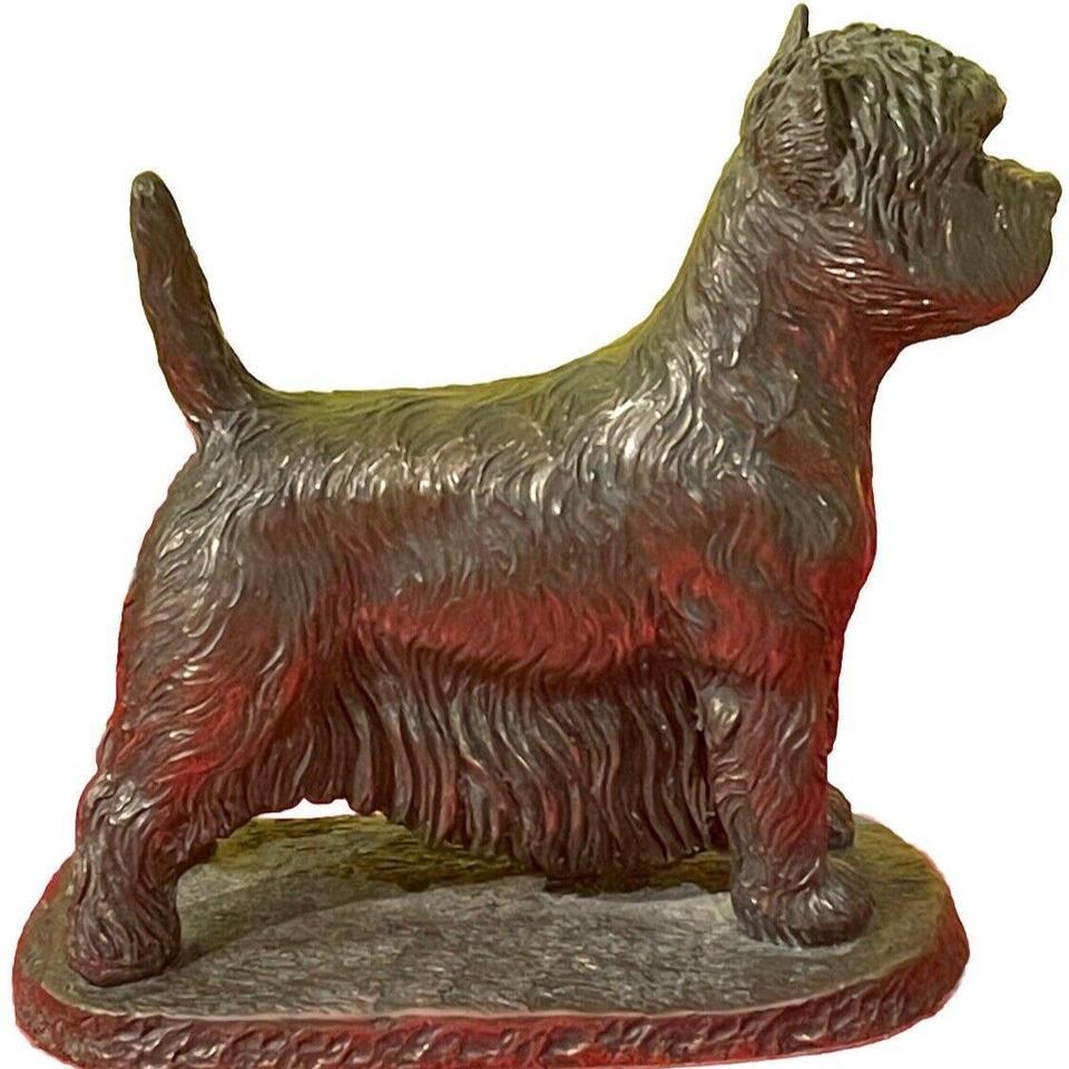 This Antique Sculpture Features A 2