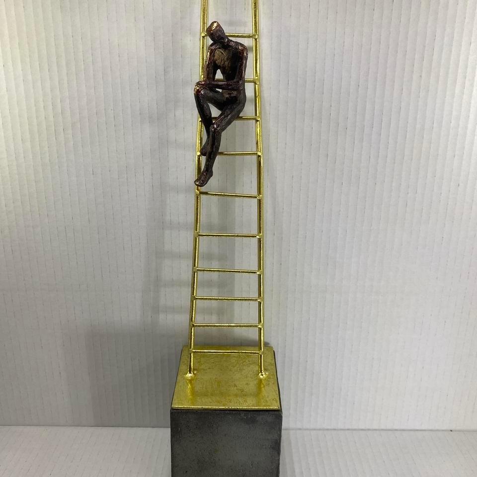 Gold And Black Bronze Statue