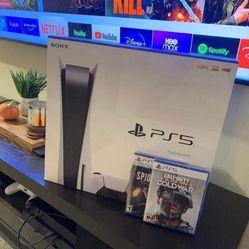 PlayStation 5 Disc Edition with games, excellent condition